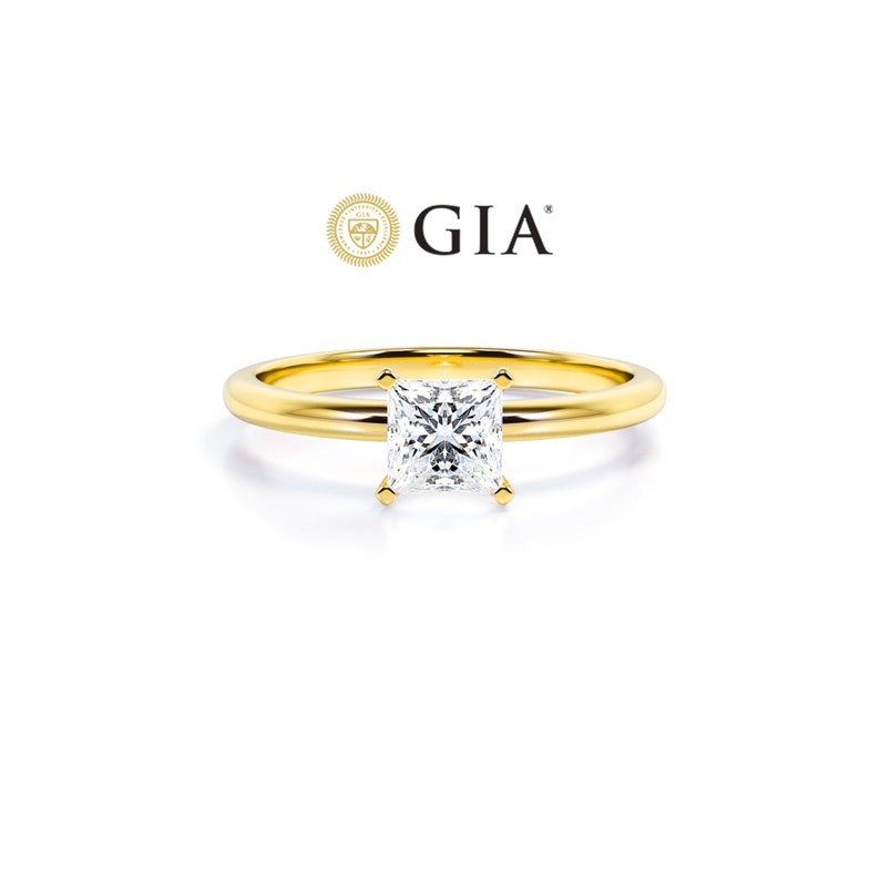 Anel Princesa De Ouro Amarelo 18k e Diamantes Brilhantes 50pts | New | anel-de-noivado, Anéis, diamante, noivado, yellow | AUREA FINE JEWELRY