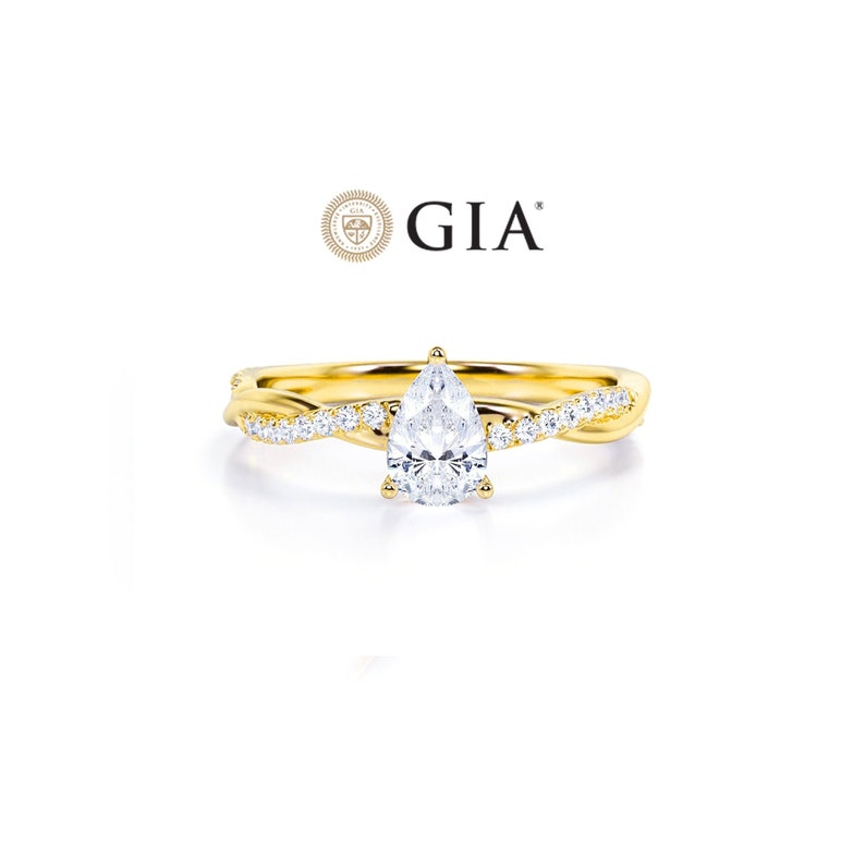 Anel Pear Solitario De Ouro Amarelo 18k Diamantes Brilhantes 50pts | New | anel-de-noivado, Anéis, diamante, noivado, yellow | AUREA FINE JEWELRY