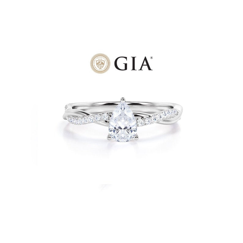 Anel Pear Solitario De Ouro Branco 18k Diamantes Brilhantes 70pts | New | anel-de-noivado, Anéis, diamante, noivado, white | AUREA FINE JEWELRY